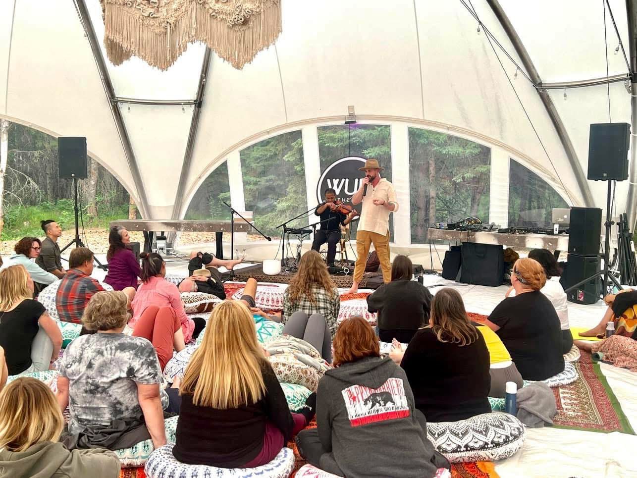 Paul working with a team in a dome